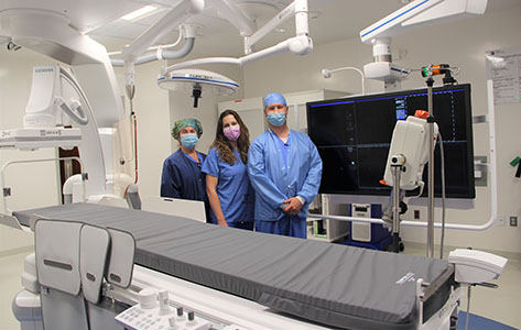 Hybrid operating room: (l-r) Debbie Dubord, RN; Shannon Pepitone, Special Procedure Tech; Tim McCarthy, Special Procedure Tech