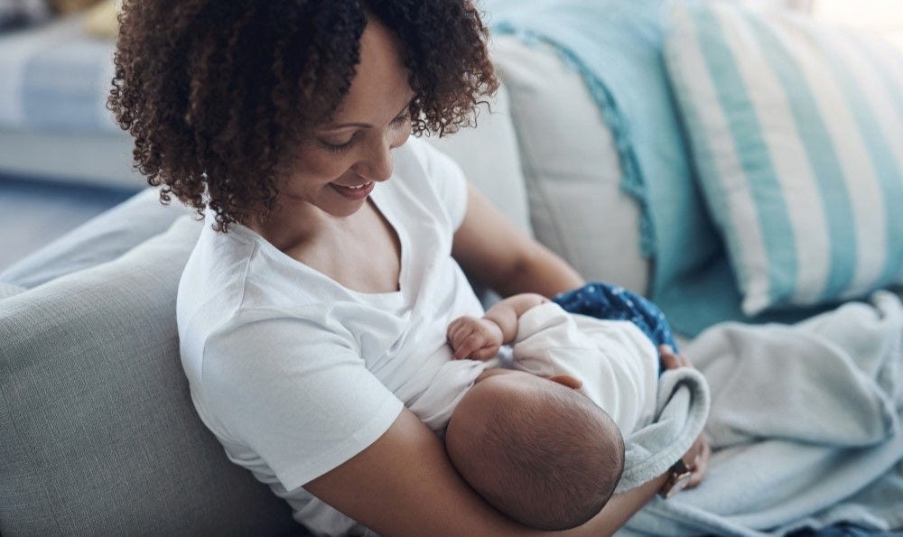 mom breastfeeding her baby