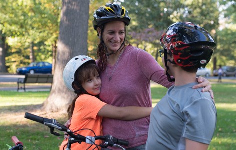 Bariatrics patient biking with kids
