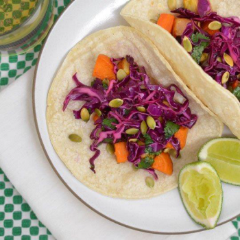 A dish of veggies tacos on a plate