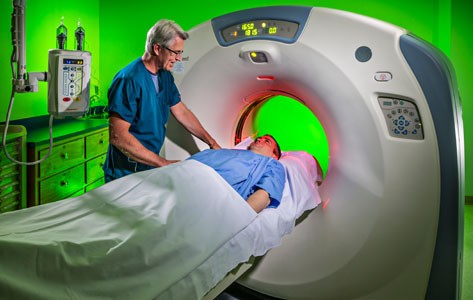 Lung and thoracic cancer patient receives CT scan