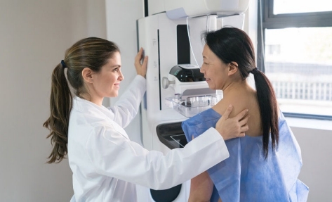 woman getting a mammogram