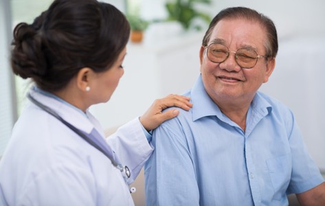 doctor talking to patient about health
