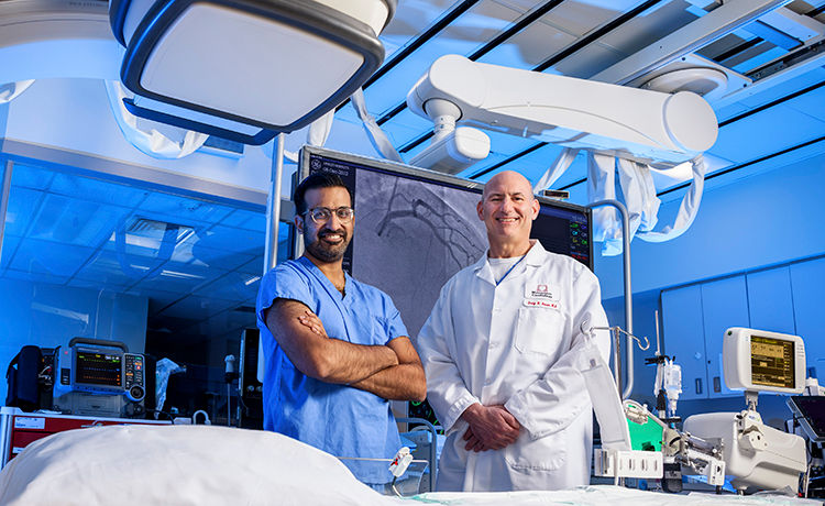 Doctor with patient performing a technique