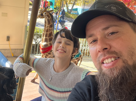 Picture of Nick T. with his daughter.