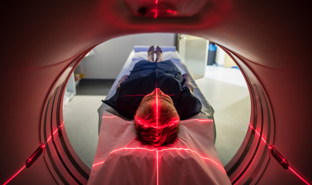 A patient undergoing a PET scan