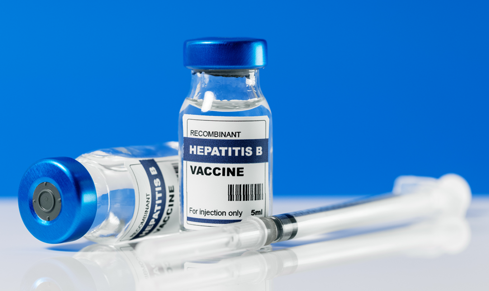 Image shows a small vial of Hepatitis B vaccine.