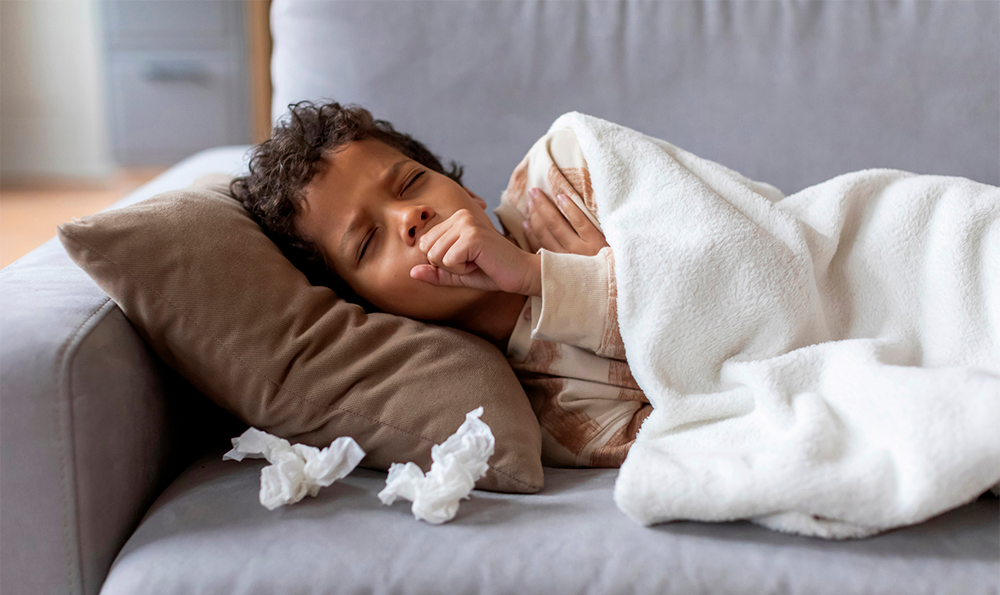 Boy sick with whooping cough.