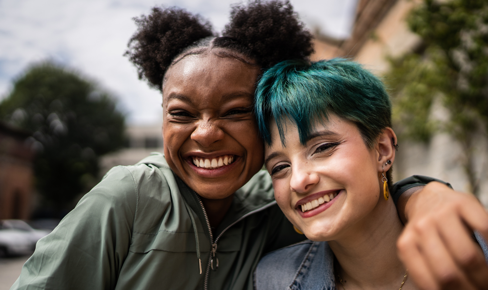 Two people smiling