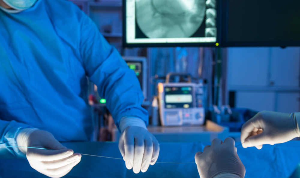 Two vascular surgeons during a surgical procedure