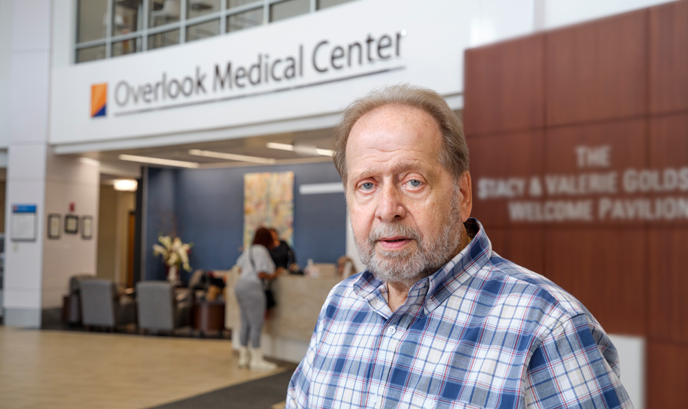 Joe sitting in the Overlook Medical Center Welcome Pavilion